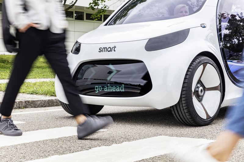 Illustration for article titled The Fully-Autonomous Electric Smart ForTwo Concept Car Has A Grille That Will Greet You With 'Hey'